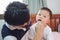 Asian Father teaching kid teeth brushing, Cute little 2 - 3 years old toddler boy child learn to brushing teeth in the morning in