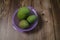 Asian favourite mango fruit called Mangga Harum Manis or Harumanis on the top of wooden table.