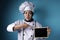 Asian Female Chef Shows Empty Blackboard, Presenting BLank Writing Template, Copy Space