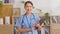 Asian female doctor with a stethoscope smile looking at camera.Nurses wear scrub smile with heartwarming comfortable.Positive