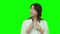 Asian female doctor thinking on Green Screen