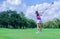 Asian female golfers preparing to play golf