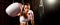 Asian female Muay Thai boxer punch fist in front of camera. Spur