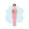 Asian female nurse in pink uniform