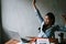 Asian female office workers are stretched sleepy sitting on the table for a long time