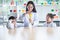 Asian female teacher Scientific experiments are being performed for children students