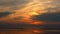 Asian fishermen walking on the beach at low tide, silhouette of two people at sunset