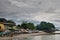 A Asian fishing village scene cloudy sky.