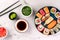 Asian food composition on a stone background, top view