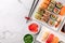 Asian food composition on stone background, top view, copy space