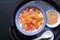 Asian Food  concept Krong Krang Dessert Sweet topical gnocchi in coconut milk in ceramic cup on rustic iron tray with copy space