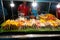 Asian food. Different mini barbecue counter at night street food market