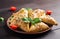 Asian food. Samsa samosa with chicken fillet and green herbs