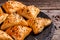 Asian food samsa or samosas with chicken fillet on cutting board. Food recipe background. Close up