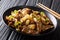 Asian food: spicy chicken stomachs with jalapeno pepper, onion,