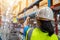 Asian Foreman and female laborer working in a warehouse.  Working Woman Concept