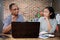 Asian Freelance Business Man Giving Presentation to Female Client at Home