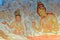 Asian fresco with women traditional outfit Sigiriya ancient rock