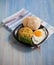 Asian fried rice homemade nasi goreng dish served with prawn crackers krupuk and sunny side up egg