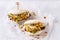 Asian fusion vegan white soft bao with meat alternative, mayo and crunchy spicy peanuts