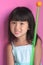 Asian girl with baton