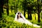 An Asian girl, a beautiful bride resting in the woods.