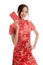 Asian girl in chinese cheongsam dress with red envelope