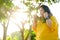 Asian girl with down syndrome exercising By walking to burn fat and jogging to exercise in the park