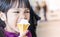 Asian girl eating Japanese soft cream