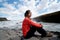 Asian girl at Gullfoss waterfall