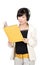 Asian girl in headphones with yellow book