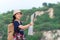 Asian girl holding map for check location adventure, tourism for destination leisure trips for education and relax in outdoors on