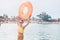 Asian girl with an inflatable circle is resting and swimming at a popular seaside resort. Vacation and water aquapark
