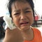 Asian girl kids crying with bandage on finger