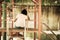 asian girl sitting alone at playground