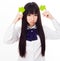 Asian girl student in school uniform arrows on face
