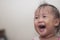 Asian Girl toddler laughing