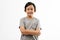 Asian good looking boy child is smiling, Happy little boy while posing at the camera on white background