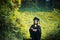 Asian  graduate in Mexican Sunflower field