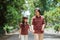 Asian grandmother with grandchildren walking together