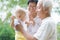 Asian grandparents playing with grandson