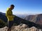 Asian guy eating a snack, view from Sardine Peak Trailhead