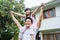 Asian Happy family father with cute daughter outdoor having fun playing the pilot of an airplane at home. Preschool little kid sit