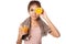 Asian healthy girl with orange juice and orange over her eye