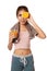 Asian healthy girl with orange juice and orange over her eye