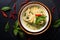 Asian home cooking Concept Thai chicken and baby bamboo Green curry on black background with copy space