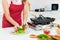 Asian housewives preparing dishes for dinner