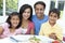 Asian Indian Parents Children Family Eating Meal