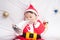 Asian Infant Baby in santa costume christmas celebration on white
