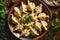 Asian-inspired manti, a delectable hot meat dish, offers a taste of the cultural richness and culinary excellence found throughout
